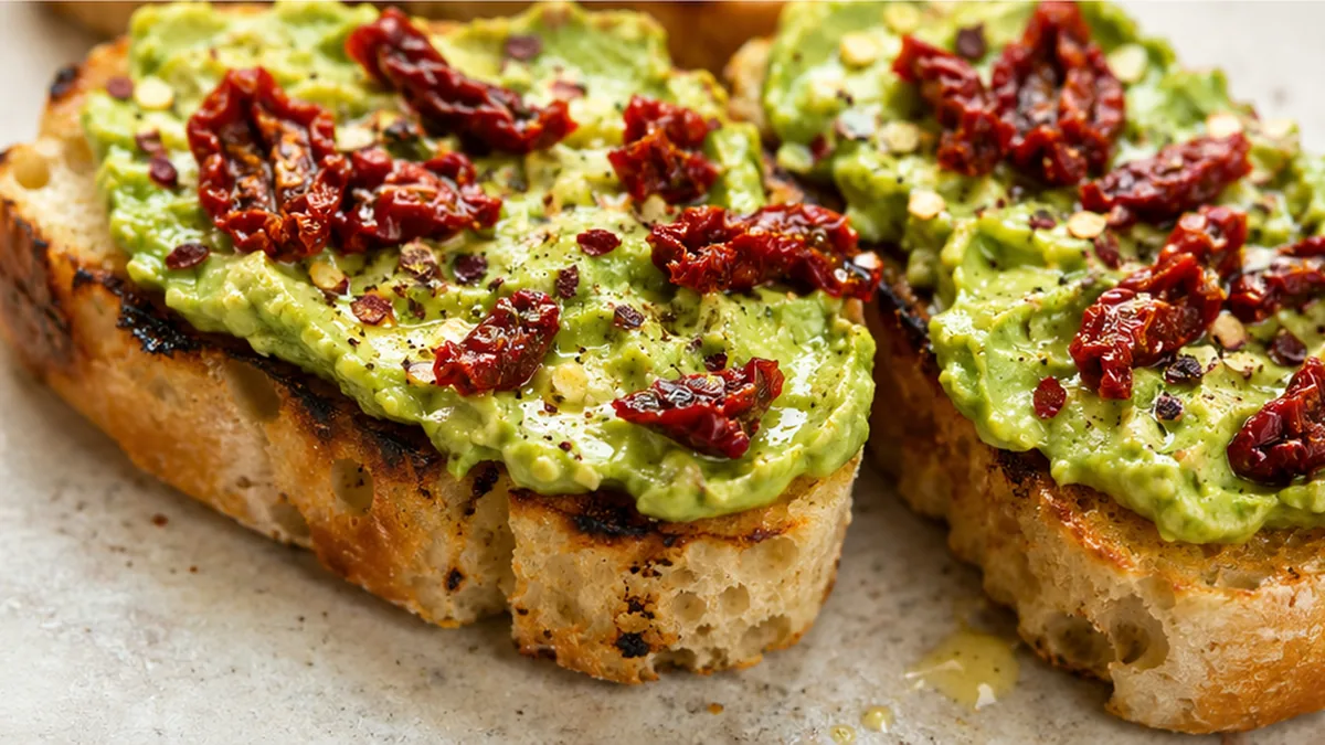 Transform Your Toast: Avocado & Sun-Dried Tomato Delight! - avocado toast - Avocado toast: transform your breakfast with this quick and healthy snack full of fl
