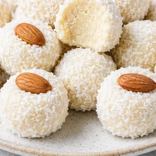 No-Bake Almond Cheesecake Truffles - Almond cheesecake truffles: whip up these amazing no-bake treats in minutes. Perfect for a quick indulgence or elegant part