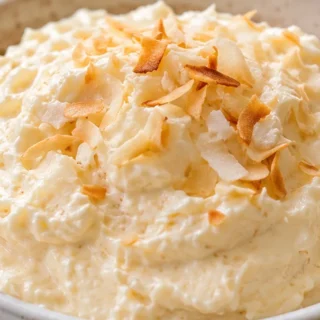 Creamy Coconut Cloud Dip Recipe - coconut cream dip - Coconut cream dip: whip up this irresistibly sweet and creamy low-carb dessert. Perfect for parties and ef