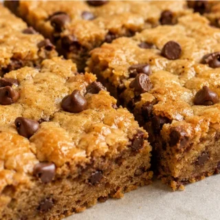 Golden Brown Butter Keto Blondies - Keto Blondies: Bake this delicious brown butter recipe featuring sugar-free chocolate chips. A perfect low-carb, gluten-free