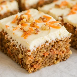 Keto Carrot Cake Bars: Guilt-Free Bliss - Keto carrot cake: bake these moist and flavorful bars with a creamy cheesecake swirl. Perfect for a low-carb treat, si