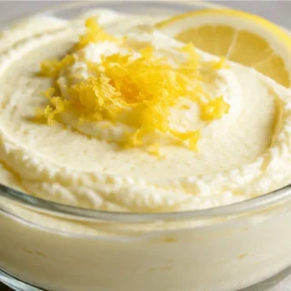 Luscious Keto Lemon Mousse: Tangy Dream Dessert! Keto lemon mousse: master this light and airy, sugar-free dessert in minutes. Perfectly tangy and creamy, ideal