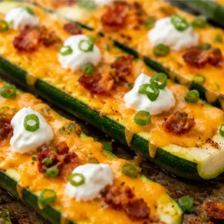 Loaded Zucchini Skins: Cheesy & Savory Snack! Loaded zucchini skins: whip up these cheesy, bacon-topped zucchini boats in under 30 minutes. Perfect for a satisf