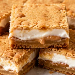 Keto Fluffernutter Bars: Guilt-Free Peanut Butter Dream - Keto Fluffernutter: Bake these delightful low-carb bars featuring a sweet marshmallow swirl. Perfect f