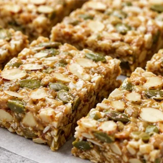 No-Bake Keto Granola Bars! So Easy & Crunchy! Keto Granola Bars: whip up these quick, no-bake, and satisfying snacks. Packed with nuts and seeds, they're perfec