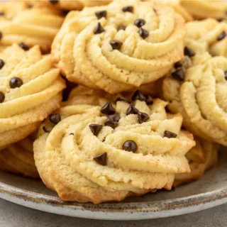 Keto Spritz Cookies: Guilt-Free Holiday Treat - Keto Spritz Cookies: enjoy festive, low-carb holiday cookies made with almond flour and erythritol sweetener. Pe