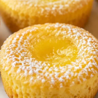 Melt-in-Your-Mouth Lemon Pudding Cakes - Lemon pudding cakes: Master these delightful individual desserts. A tender cake top with a rich, tangy pudding layer un