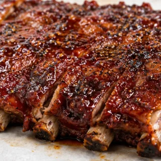 Fall-Off-The-Bone Oven Ribs - oven baked ribs - Oven Baked Ribs: master perfectly tender, juicy pork ribs with a rich spice rub and sticky BBQ glaze. Achieve fa