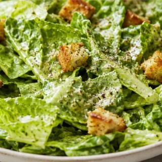 Zesty Pesto Caesar Salad! Pesto Caesar salad: master this bright, herby twist on a classic. Craft a creamy dressing with fresh ingredients, perfect for a quick