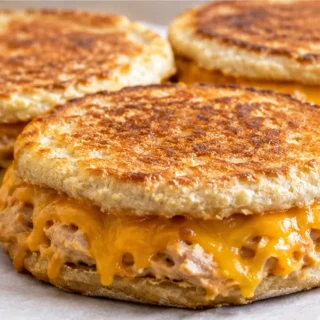 Golden Tuna Melts: Crispy & Cheesy Perfection! Tuna Melts: prepare these cheesy, crispy open-faced sandwiches in under 15 minutes. A perfect quick lunch or sati