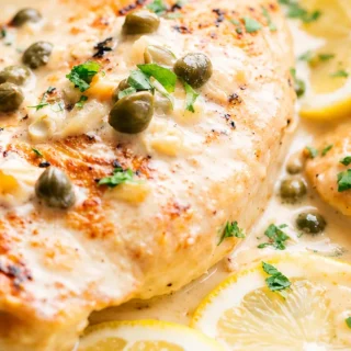 Lemon Chicken Scallopini - Lemon chicken scallopini: Master this quick and creamy pan-seared chicken dish in under 35 minutes. Tender chicken with a luscious le